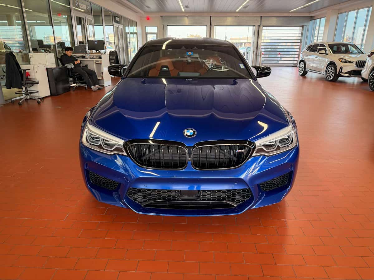 New car on display in a dealership showroom