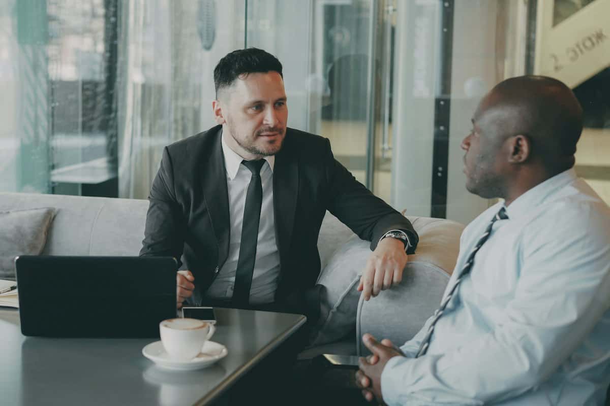 Lawyer meeting a new client at a conference table